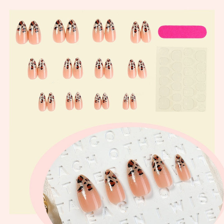 Nail art set with elegant leopard pattern and glitter accents Kalsten