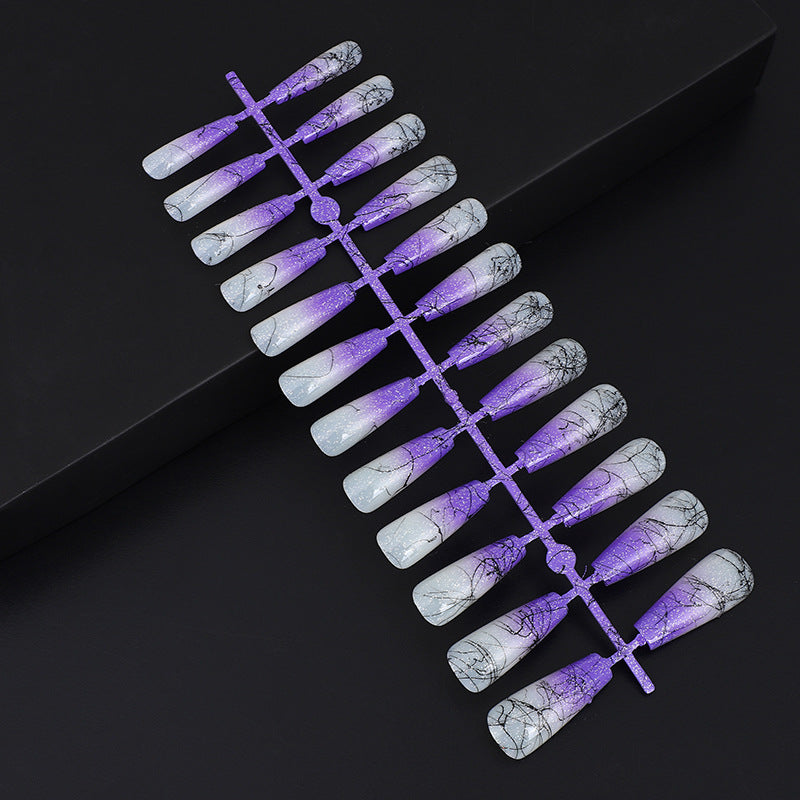 Artificial nails in modern ombre design with marbled accents Kalsten