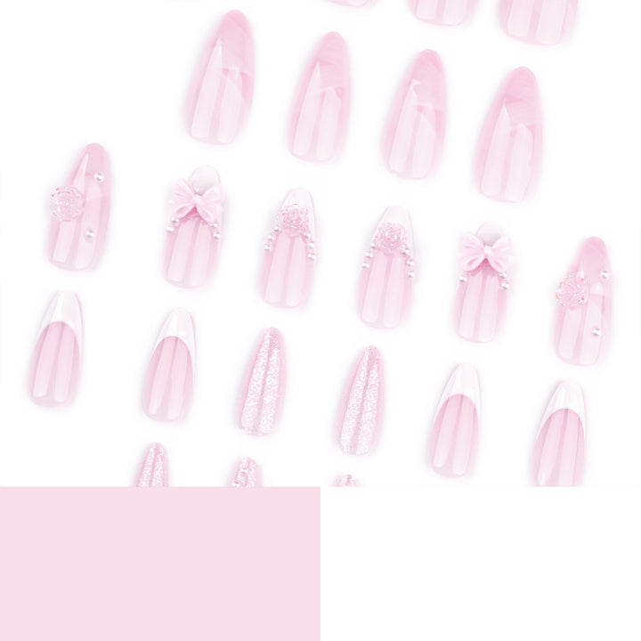 Artistic nail extensions with floral decorations and glitter accents Kalsten