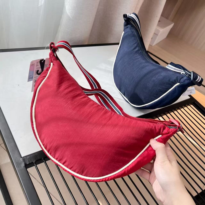 Shoulder bag with adjustable shoulder strap and versatile interior compartment Kalsten