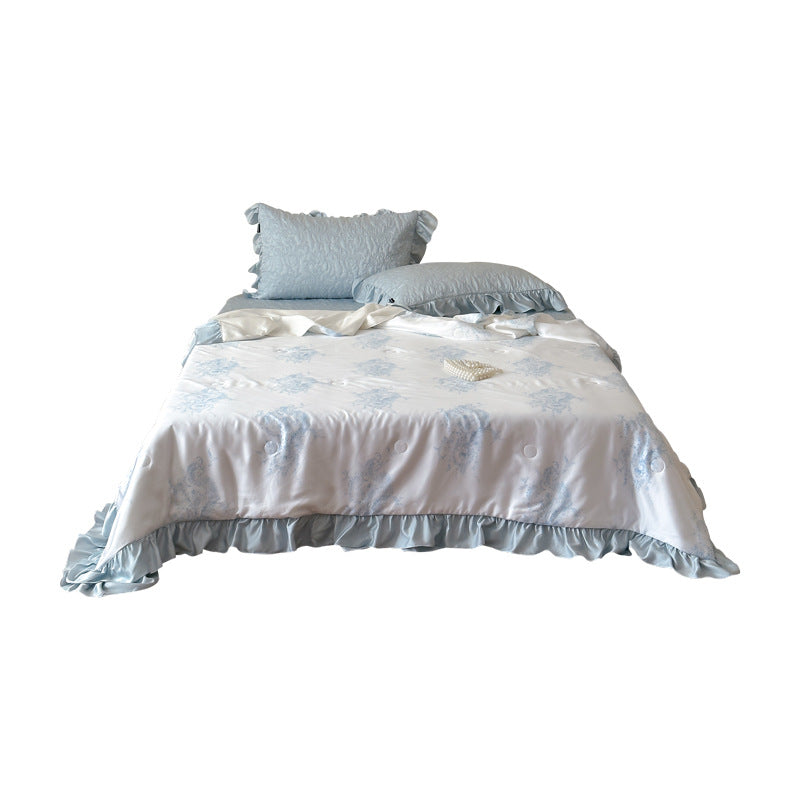 Quilted bedspread with ruffle and reversible satin bedding set