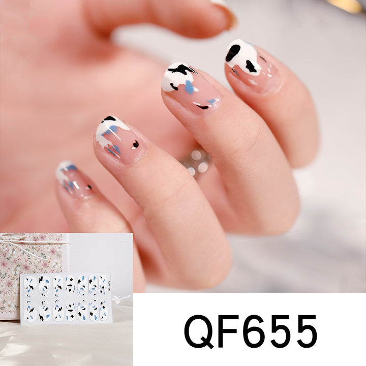 Artificial nail art with heart-shaped designs and soft color gradients Kalsten