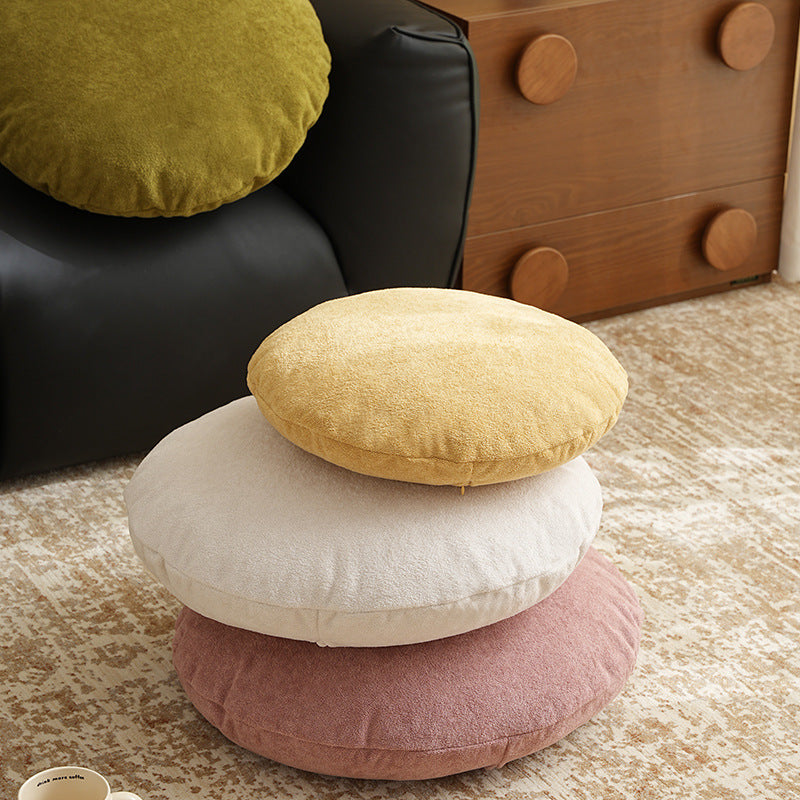 Round floor seat pouf made of teddy plush with a shape-retaining padded core Kalsten