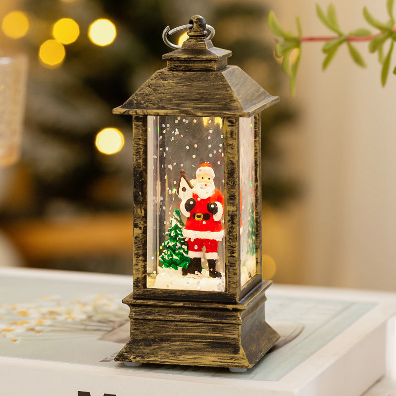 Christmas lantern with LED lighting and decorative snow effect