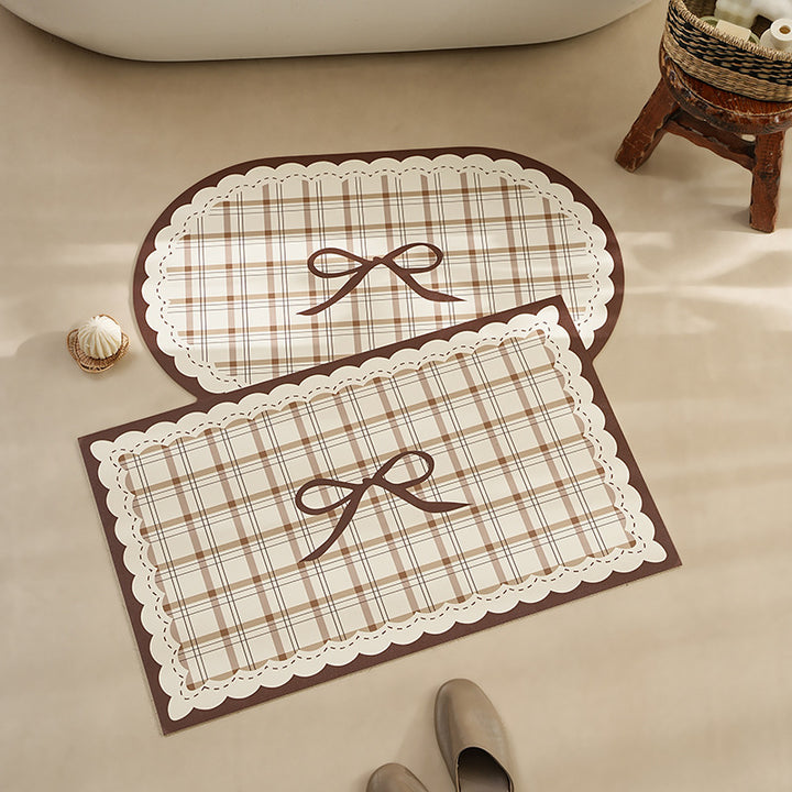 Rectangular wipeable placemat with checked pattern, wavy decorative edge and bow motif Kalsten