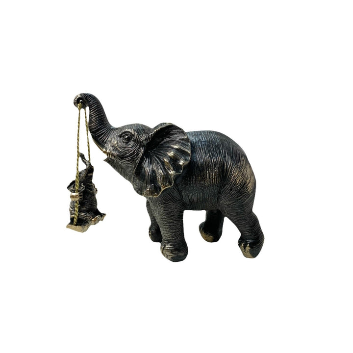 Decorative elephant figure with child Kalsten