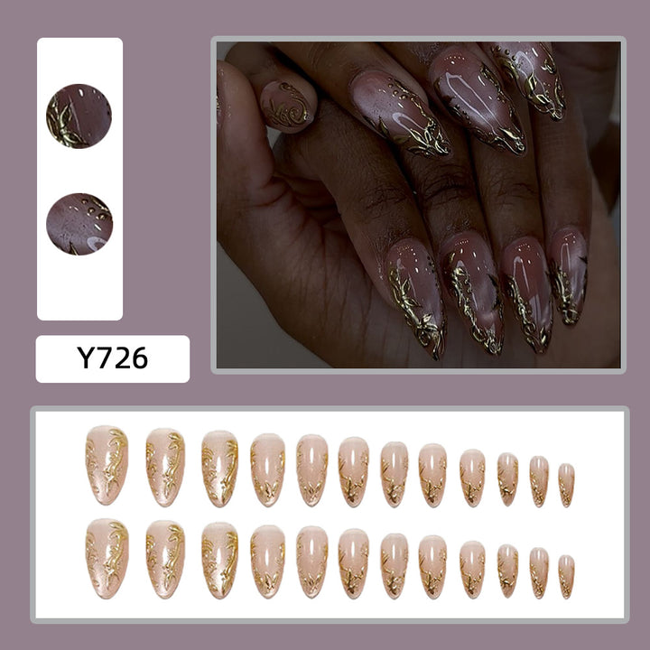 Exquisite artificial nails with golden decorations Kalsten