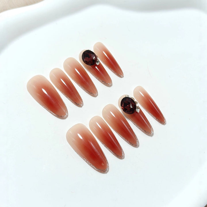 Glittering artificial nails with elegant tip design and crystal decoration Kalsten