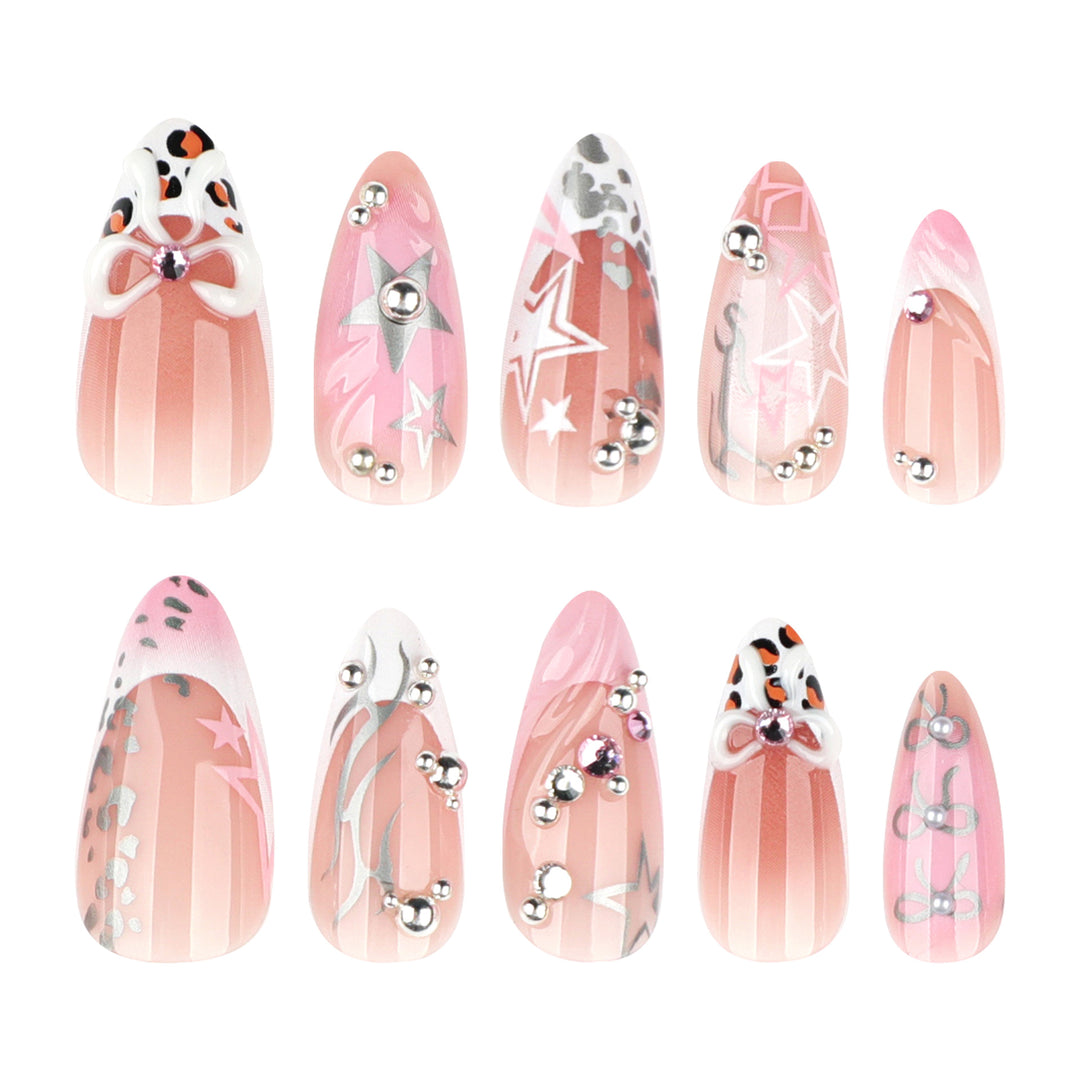 Artful stiletto nails with glitter and bow decorations Kalsten