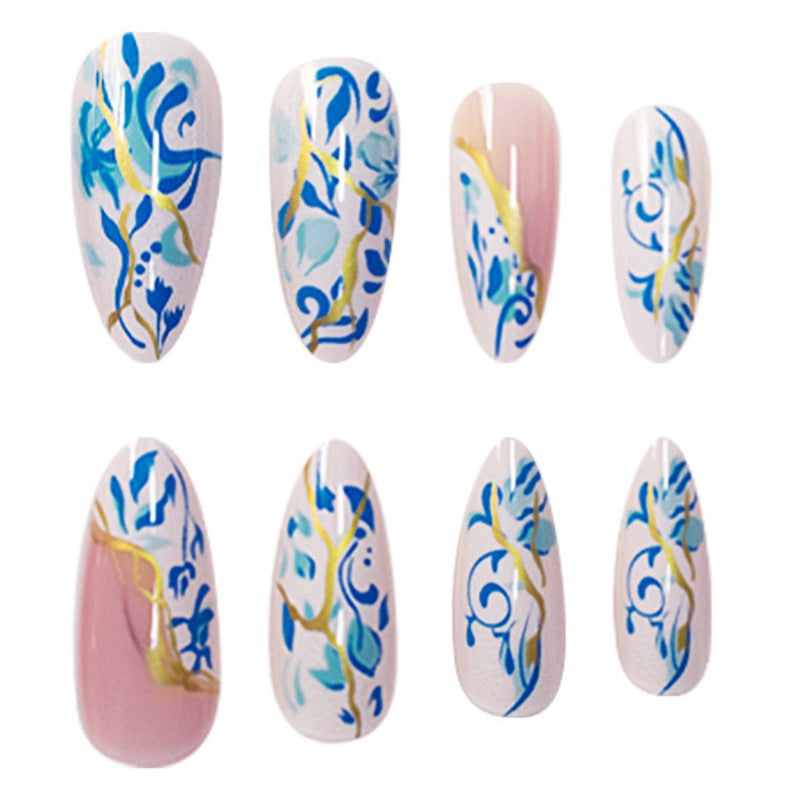 Artistic Floral Press-On Nail Design with Gold Accents Kalsten