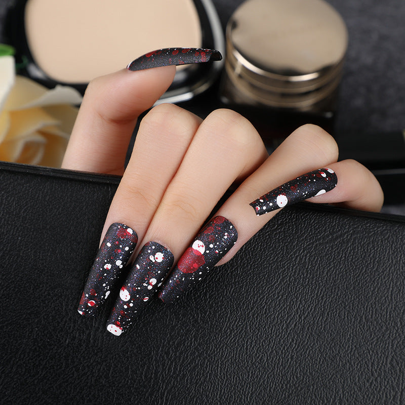 Artistic splatter design artificial nails Kalsten