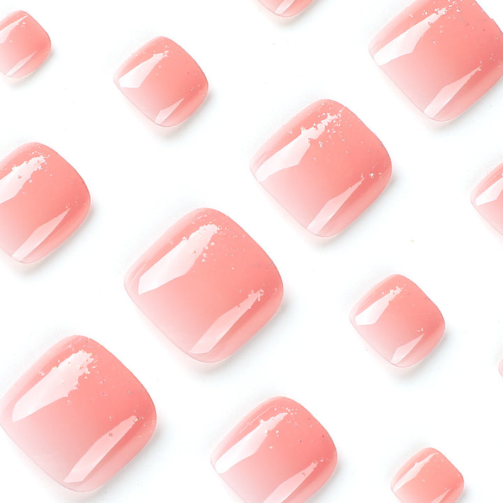 Artful toenail design with glittering accents Kalsten