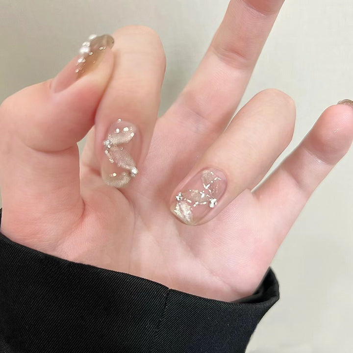 Elegant artificial nails with pearl decorations and glitter effects Kalsten