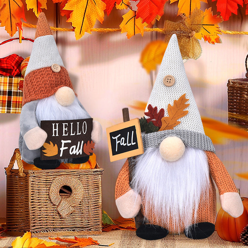 Autumn handmade decorative gnome figure with knitted hat, felt leaf application and pumpkin detail