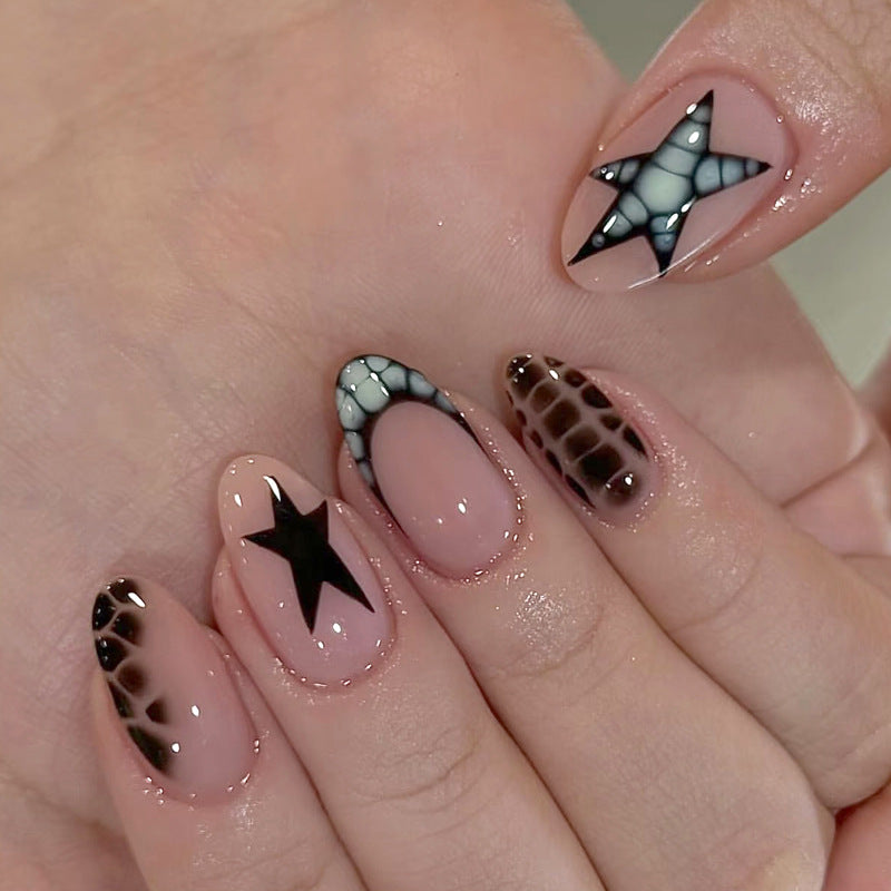 Artistic Press-On Nail Set with Star and Animal Print Accents Kalsten