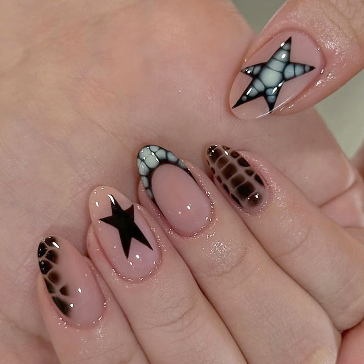 Artistic Press-On Nail Set with Star and Animal Print Accents Kalsten
