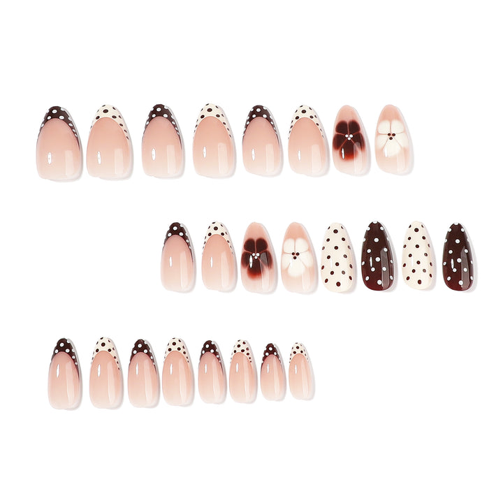 Artful nail art with floral design and various patterns Kalsten