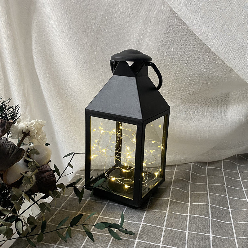 Decorative Metal and Glass Lantern with Warm LED Fairy String Lights Kalsten