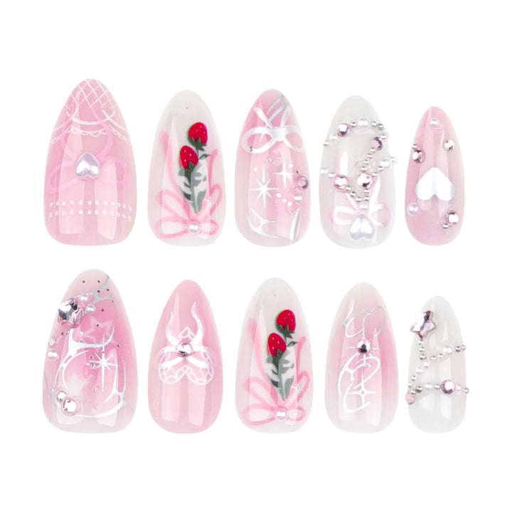 Artificial nail art with romantic design and glitter accents Kalsten
