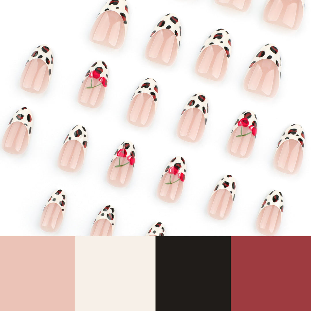 Artful animal pattern nails with cherry accents Kalsten