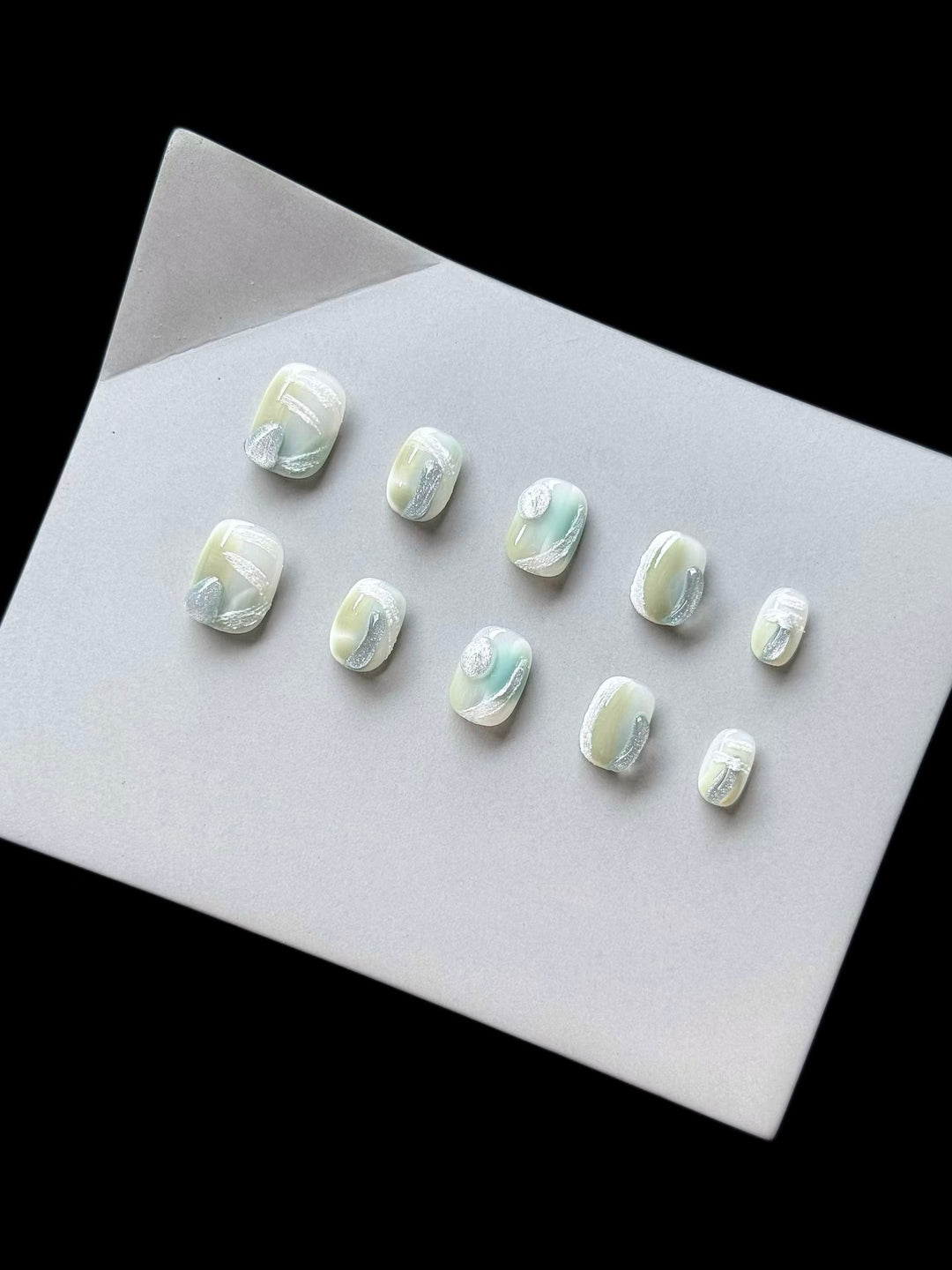 Artistic Press-On Nail Set with Glossy Marble Design