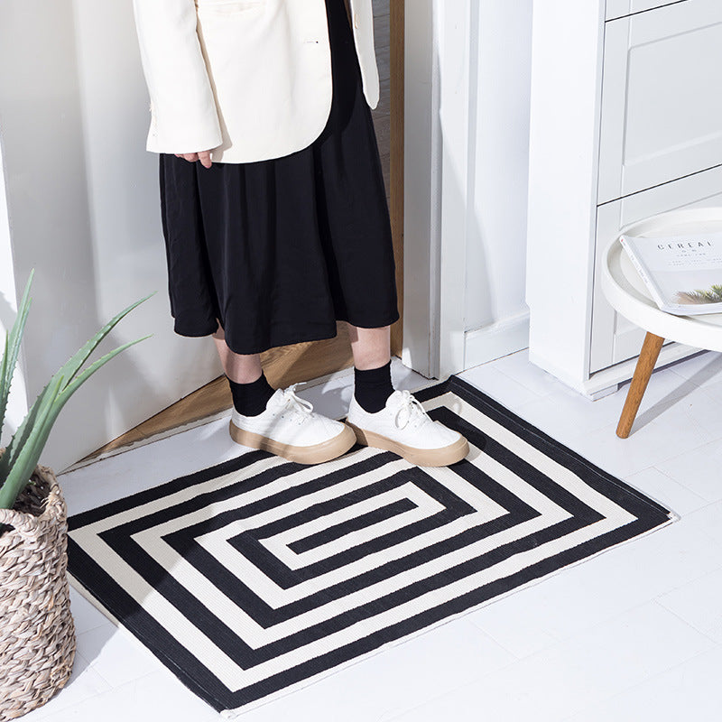 Woven cotton blend bath mat in buffalo check with flat weave structure Kalsten
