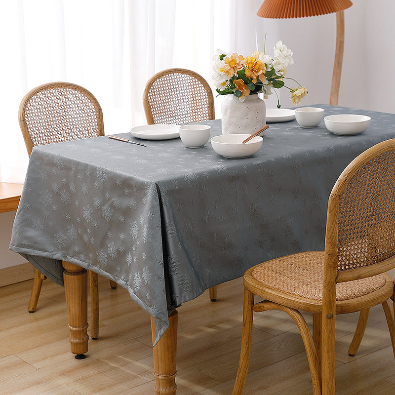 Rectangular premium table linen made of jacquard polyester with subtle frost floral embossing Kalsten