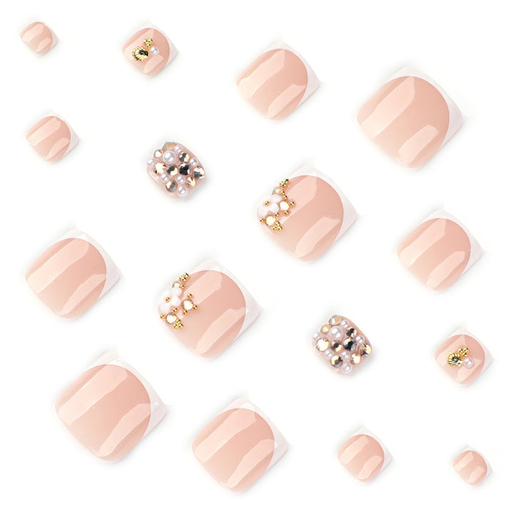 Glamorous toenail art with luxurious rhinestone and floral designs Kalsten