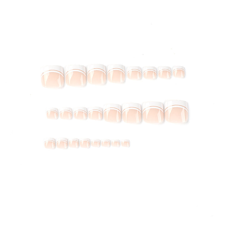 Artful toenail art with elegant French tip design Kalsten