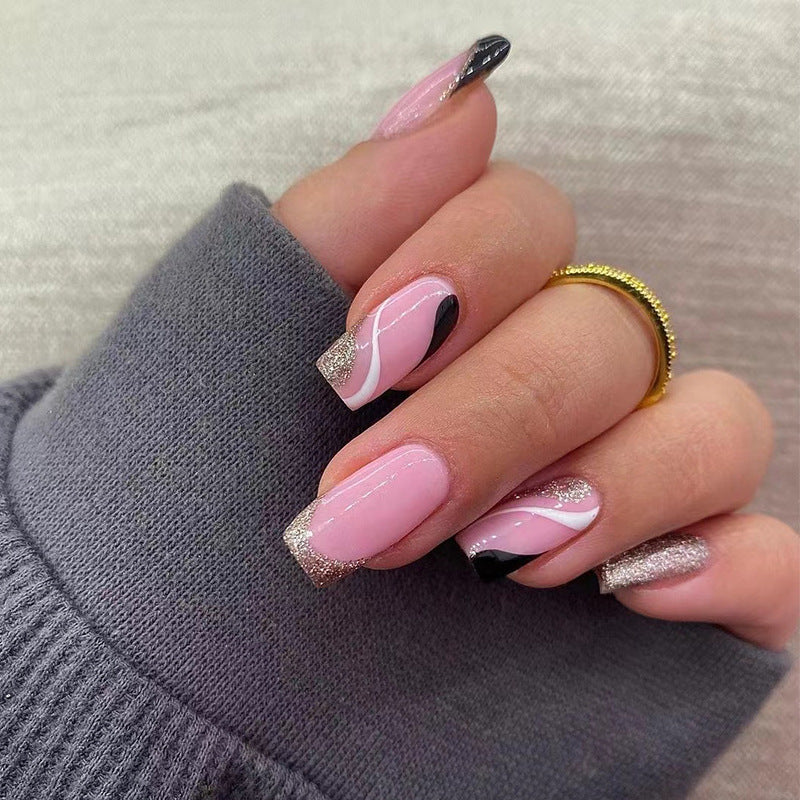 Trendy Nail Art with Glitter and Wave Accents Kalsten