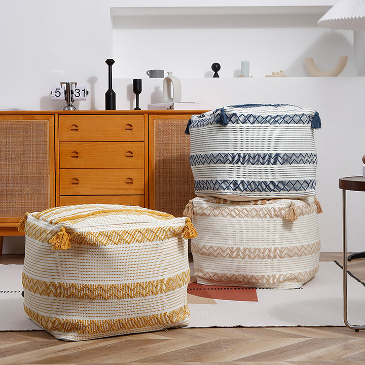 Square Boho seat pouf made of woven cotton blend with tassels and removable cover Kalsten