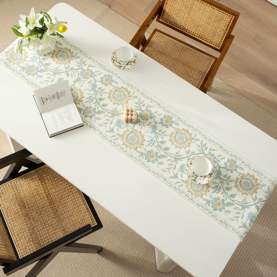 Woven decorative table runner with floral medallion borders and fringes Kalsten