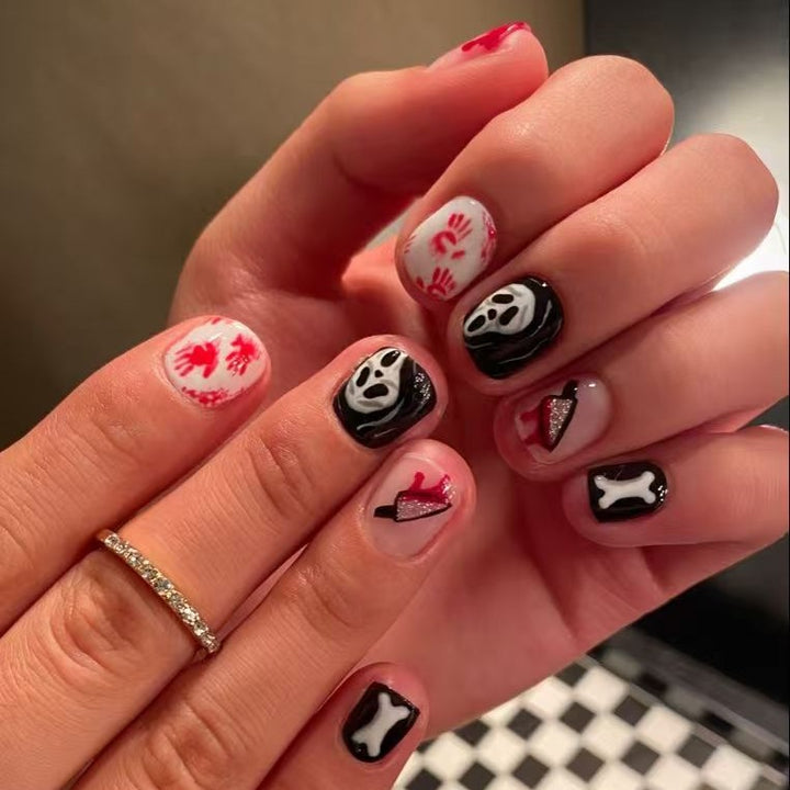 Creative Halloween Nail Art Set with Creepy Designs and Sparkling Accents Kalsten