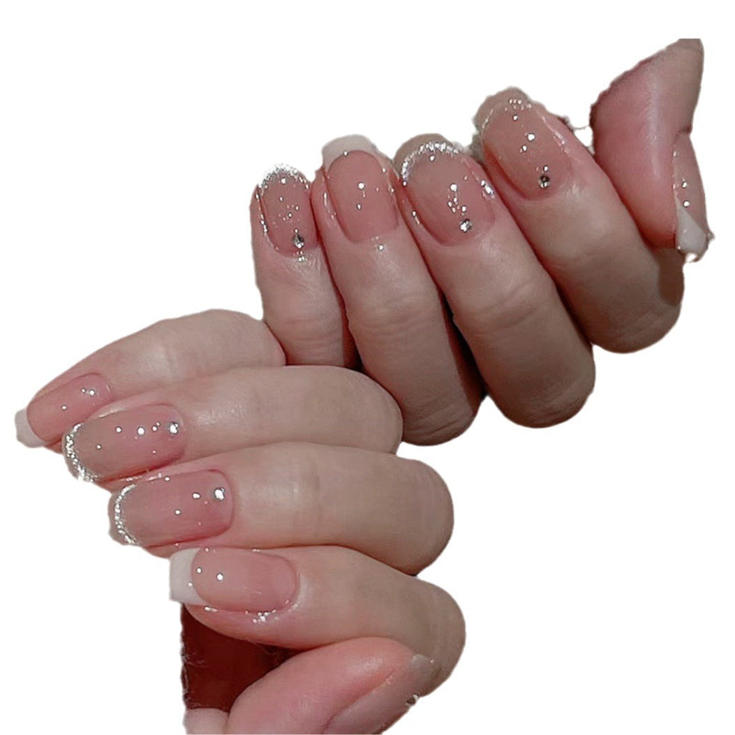 Glamorous artificial nails with filigree rhinestone details Kalsten