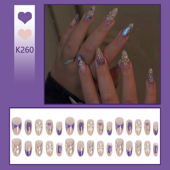 Elegant artificial nails with floral design and color accents Kalsten