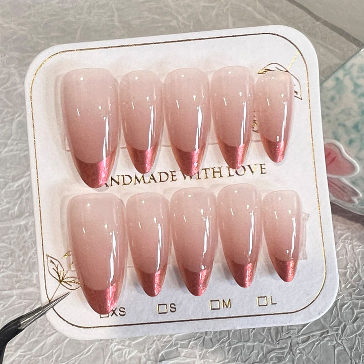 Artificial nail extensions with elegant ombre design Kalsten