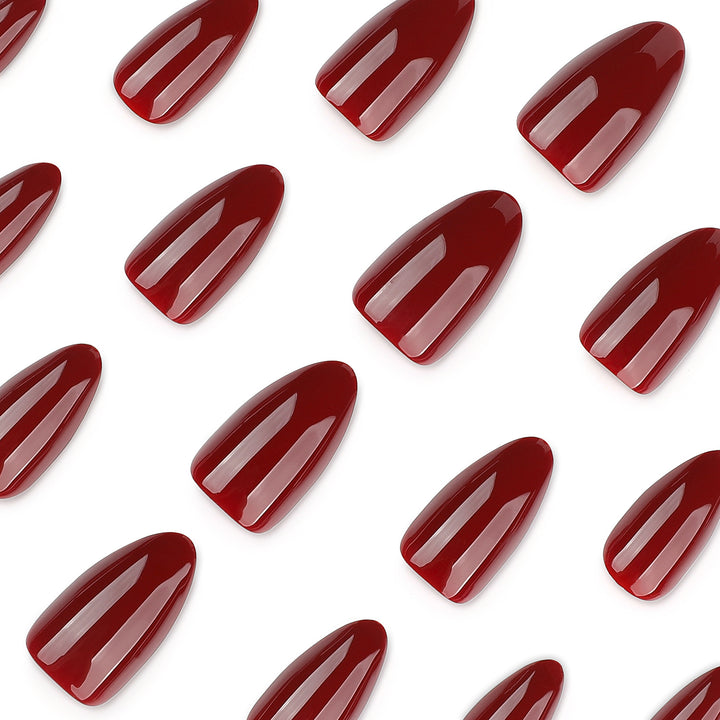 Glamorous stiletto nails with high gloss and elegant design accents Kalsten