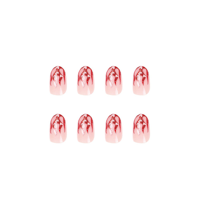Artificial nail art with romantic heart and flame design Kalsten