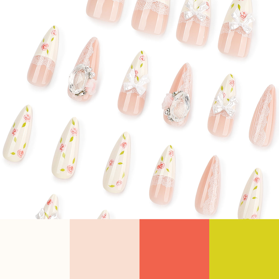 Artful stiletto nails with floral accents and glitter accents Kalsten