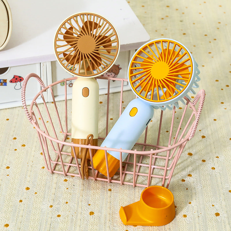 Portable hand fan with ergonomic grip and USB charging function Kalsten