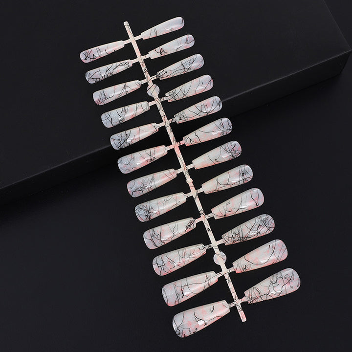 Creative nail art with blood splatter design Kalsten