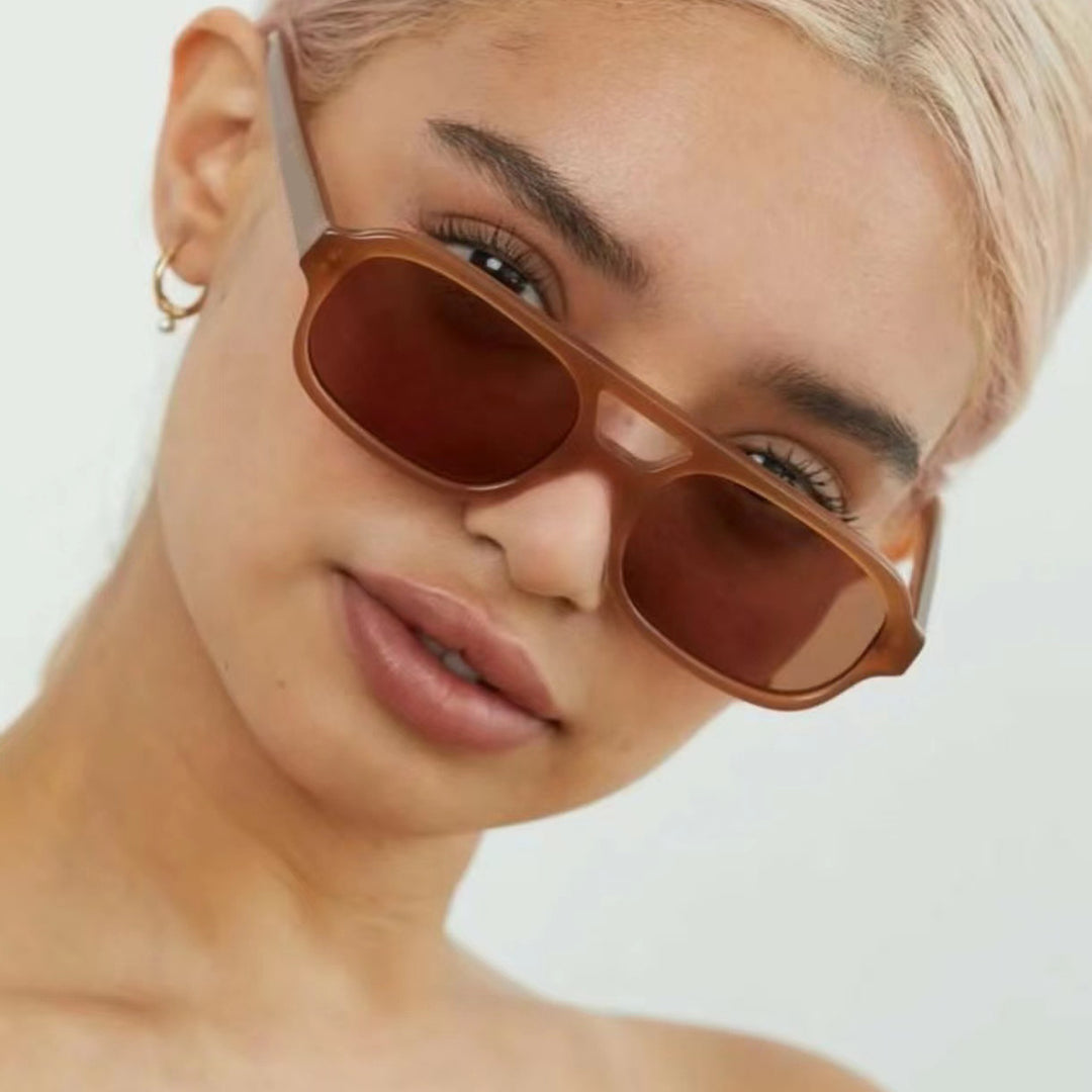 Women's fashionable square sunglasses made of transparent plastic Kalsten