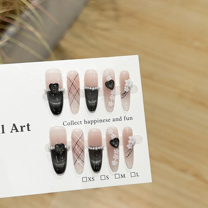 Artistic Press-On Nail Art Set with Floral and Heart Accents