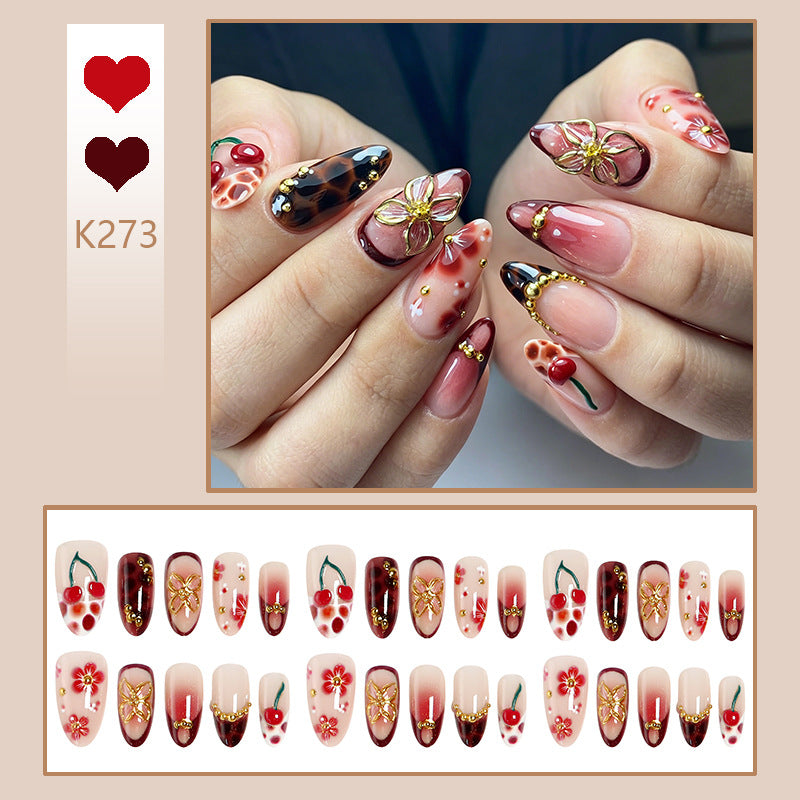 Artificial nail set with elegant floral designs and glitter effect Kalsten