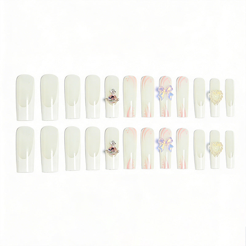Artificial nails with delicate embellishments Kalsten
