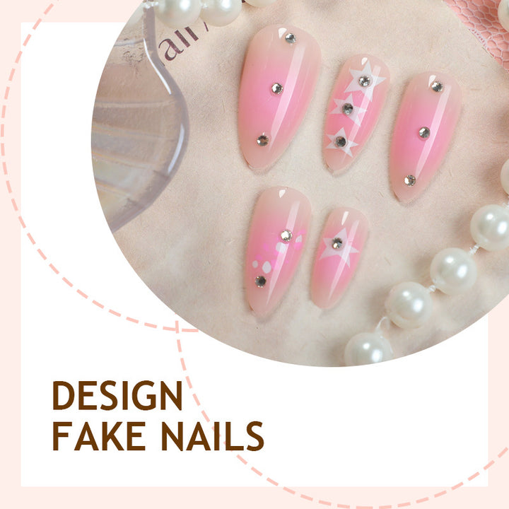 Artificial nail set with sparkling rhinestone accents and playful star motifs Kalsten