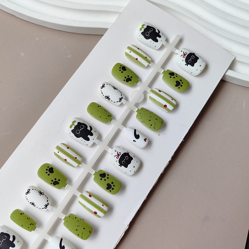 Creative art press-on nails with playful animal design Kalsten