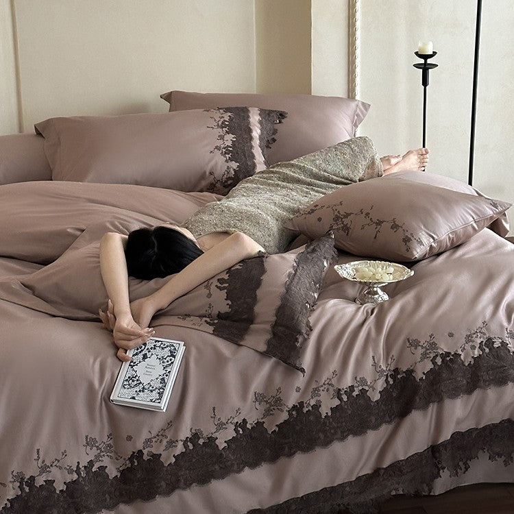 Shiny satin bedding set with fine lace application and floral relief embroidery