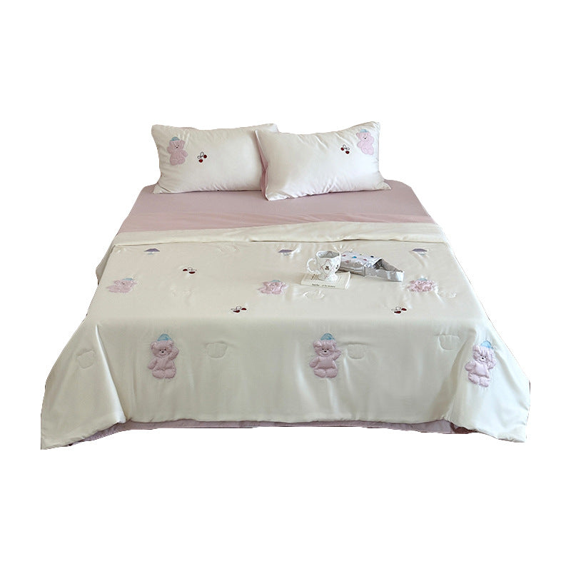 Satin bedding set with playful whale print and silky shiny surface