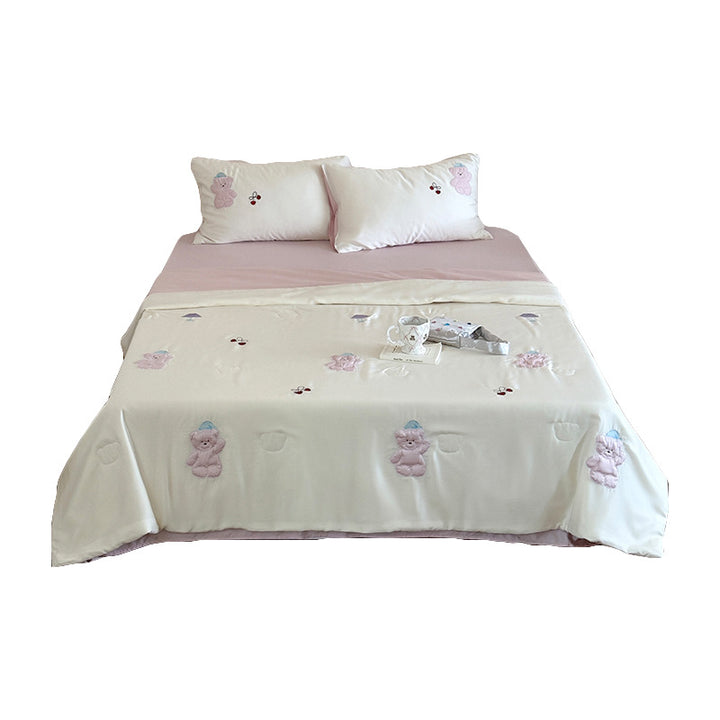 Satin bedding set with playful whale print and silky shiny surface